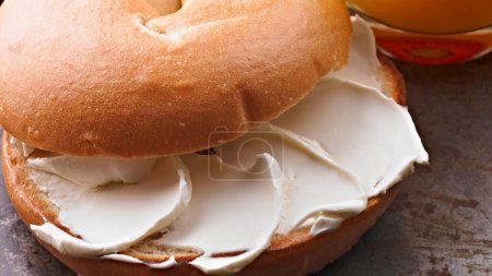 Morning Bliss: Top Close-Up of Bagel with Cream Cheese in 4K image