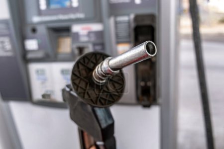 Photo for 4K Ultra HD Image: Close-Up of Fuel Pump at Gas Station - Modern Refueling Experience - Royalty Free Image