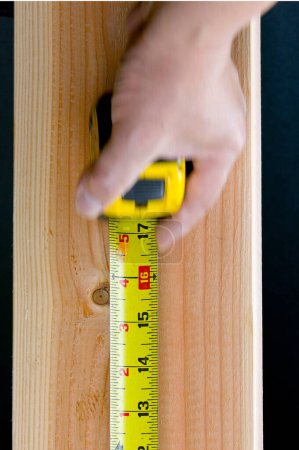 Photo for Measuring on 2x6 Framing Lumber - 4K Ultra HD Image of Construction Detail - Royalty Free Image