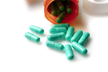 Medication Essentials: 4K Ultra HD Image of Prescription Pills with Bottles in the Background