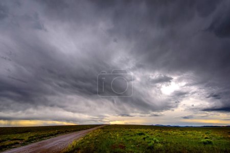 Nature's Drama: 4K Ultra HD Image of Beautiful Natural View of Thundercloud with Rain on the Plains Road