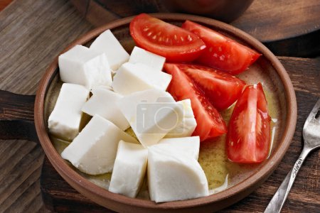 Close-Up 4K Ultra HD Image of Mozzarella Cheese with Tomato - Stock Photography