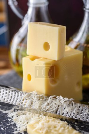 Close-Up 4K Ultra HD Image of Grating Cheese - Stock Photography