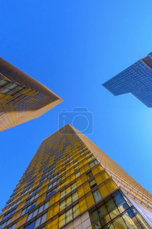 Sunlit Cityscape: Captivating 4K Ultra HD Picture of Modern Buildings and Skyscrapers