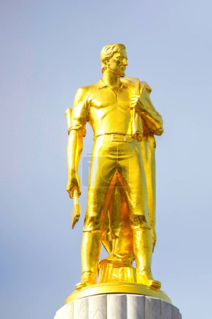 Golden Icon: 4K Ultra HD Image of Gold Man atop State Capitol Building in USA
