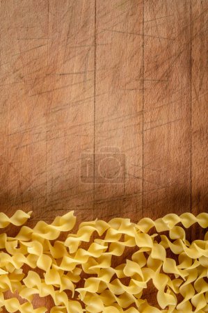 Pasta Perfection: Captivating 4K Ultra HD Picture of Pasta Arrangement on Wooden Board