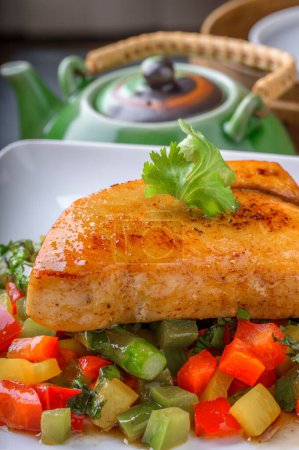 Gourmet Delight: Close-Up 4K Ultra HD Picture of Pan-Grilled Yellowtail Fish with Sauted Vegetables