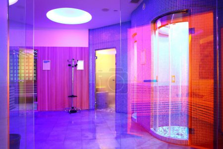 Relaxation Oasis: Spa Center with Baths, Saunas, and Multi-Colored Lighting (4K Image)