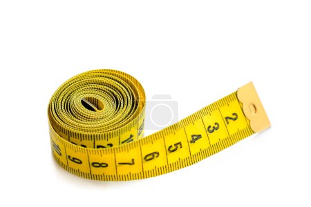 Photo for Yellow isolated metric measuring tape isolated on white background. Centimeter, close-up. - Royalty Free Image