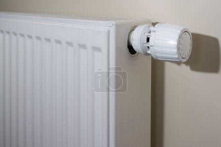 Photo for Heating Radiator, White radiator in an apartment. - Royalty Free Image