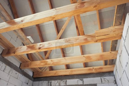 Photo for Roof roof structures. Wooden structures Roofing construction from wooden beams, logs. - Royalty Free Image