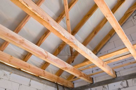 Photo for Wooden frame of the new roof. Roof structures. Wooden structures. - Royalty Free Image