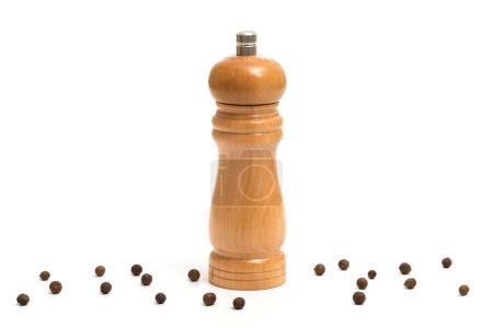 Photo for Wooden pepper mill isolated on white background. Cooking concept - Royalty Free Image