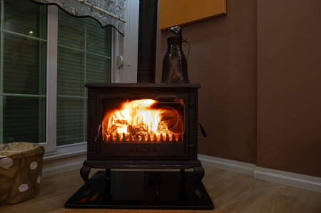 Fireplace in the lounge in winter.