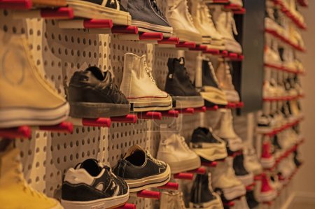 Photo for Shoes on display in a shoe shop. - Royalty Free Image