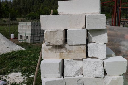 Aerated lightweight gypsum building concrete blocks prepared for building wall modular building house. New Architecture concept.