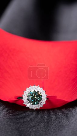 Photo for Beautiful diamond ring on a red rose petal - Royalty Free Image