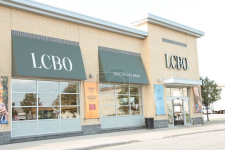 Photo for Lcbo liquor control board of ontario store with logo sign letters writing text on front entrance and wine spirits beer windows with front automatic doors open - Royalty Free Image