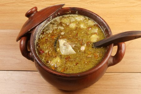 Un tazón de lodeh terong, comida asiática.