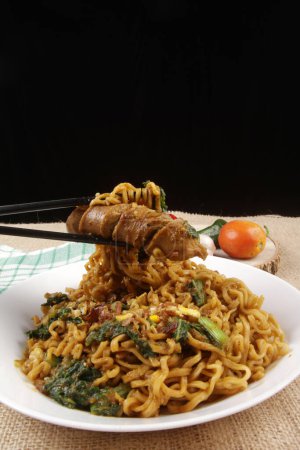 Photo for A bowl of fried noodles with sausage - Royalty Free Image