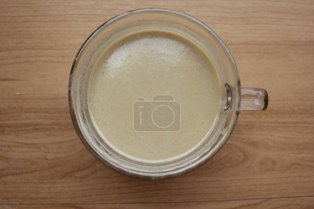 Photo for A glass of kolak pisang, asian food - Royalty Free Image