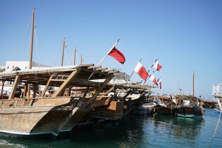 old wooden boats in port of the city, the port of Doha, Qatar