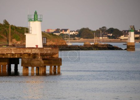 two green lighthouses at the entrance of Lorient port