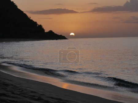 Photo for Sunset over Grande Anse beach in Deshaies, Guadeloupe, west indies - Royalty Free Image
