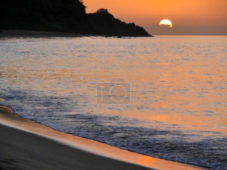 Photo for Sunset over Grande Anse beach in Deshaies, Guadeloupe, frenchwest indies - Royalty Free Image