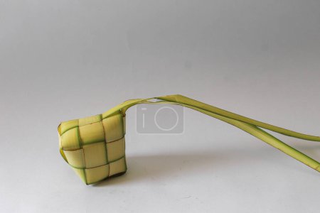 Photo for Picture of ketupat with white background, ketupat is a traditional food with delicious taste, - Royalty Free Image