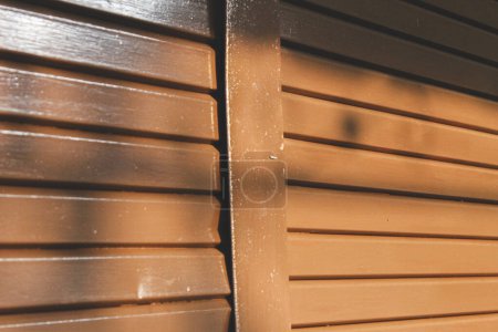 Photo for A picture of brown rolling door with light and shadow - Royalty Free Image