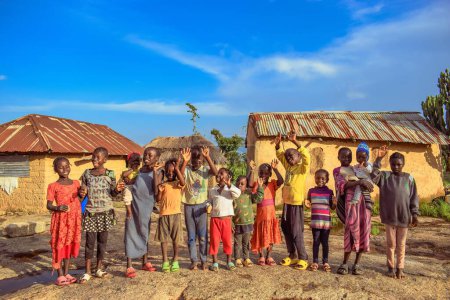 Photo for Abuja, Nigeria - March 6, 2023: African Children having a good time. Goofy moments with Local African Children Outdoor Under a Sunny Blue Sky Environment. - Royalty Free Image