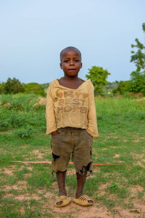 Téléchargez les photos : Abuja, Nigéria - 1er mai 2023 : Portrait d'un enfant africain. Random Candid Moments with African Children. Heureux enfant africain. Journée de l'enfant en Afrique. - en image libre de droit
