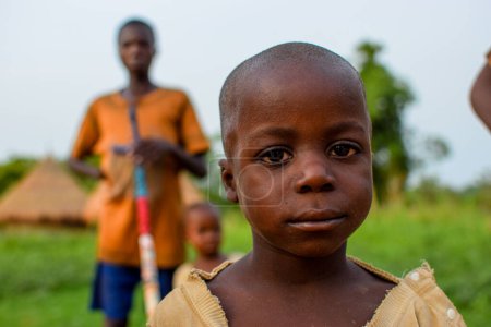Téléchargez les photos : Abuja, Nigéria - 1er mai 2023 : Portrait d'un enfant africain. Random Candid Moments with African Children. Heureux enfant africain. Journée de l'enfant en Afrique. - en image libre de droit