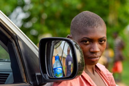 Téléchargez les photos : Abuja, Nigéria - 1er mai 2023 : Portrait d'un enfant africain. Random Candid Moments with African Children. Heureux enfant africain. Journée de l'enfance en Afrique. - en image libre de droit