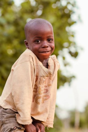 Photo for Abuja, Nigeria - May 1, 2023: Portrait of african child. Random Candid Moments with African Children. Happy African Child. Childrens Day in Africa. - Royalty Free Image