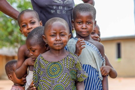 Foto de Abuja, Nigeria - 1 de mayo de 2023: Retrato de un niño africano. Random Candid Moments with African Children. Feliz niño africano. Día del Niño en África. - Imagen libre de derechos