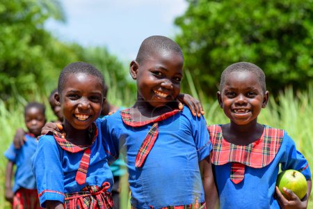 Photo for Abuja, Nigeria - June 12, 2023: African Child Young Students Learning in a Rural Community. Smiling African Children Wearing School Uniform. Education in African. - Royalty Free Image