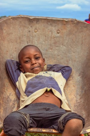 Photo for Jos East, Plateau State, Nigeria - May 12, 2021: Portrait of happy african boy - Royalty Free Image