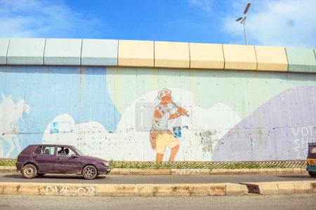 Photo for Abuja, Nigeria - June 20, 2023:  View on the colorful etnical graffiti on the wall in Abuja city - Royalty Free Image