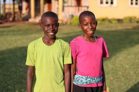 Photo for Abuja, Nigeria - November 6, 2021: Portrait of African Children with a Smile. Twins. Siblings. Boy and Girl - Royalty Free Image