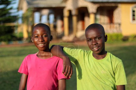 Téléchargez les photos : Abuja, Nigeria - November 6, 2021: Portrait of African Children with a Smile. Twins. Siblings. Boy and Girl - en image libre de droit