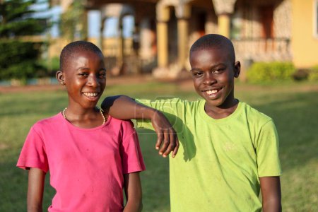 Photo for Abuja, Nigeria - November 6, 2021: Portrait of an African Children with a Smile. Twins. Siblings. Boy and Girl - Royalty Free Image