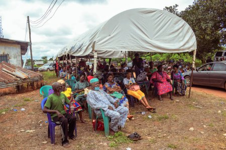 Photo for Aluu, Port Harcourt, Nigeria - August 10, 2021: African People Waiting on a Queue for Medical Care and Attention in a Rural Community - Royalty Free Image