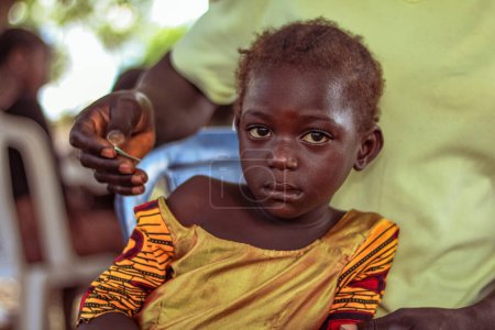 Photo for Abuja, Nigeria - June 20, 2023: Community Sensitization on Covid 19, Health and Water Hygiene of Indigenous Africa Villages. Election Campaign Meeting. Cancer Awareness Program and Empowerment - Royalty Free Image