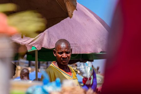 Photo for Abuja, Nigeria - January 20, 2023: Buying and Selling in an African Market Place. Edible and Perishable Food Market in Nigeria. People Relating in the Market - Royalty Free Image