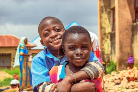 Téléchargez les photos : Abuja, Nigeria - June 5, 2022: Portrait of African Children. Random Candid Moments with African Children. Happy African Children - en image libre de droit