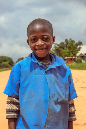 Photo for Plateau State, Nigeria - June 5, 2022: Portrait of an African Child. Random Candid Moments with African Child Outdoor - Royalty Free Image