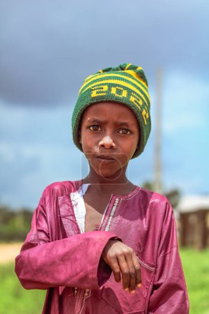 Téléchargez les photos : État du Plateau, Nigéria - 5 juin 2022 : Portrait d'un enfant africain. Moments Candides Aléatoires avec l'Enfant Fulani Africain. - en image libre de droit
