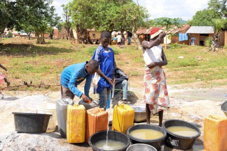 Photo for Abuja Nigeria - September 02, 2021: Water Pumping Test in African Rural Community. Bore Well Pump Capacity Test. Rural Clean Water Project Implementation for Indigent Communities in Africa. - Royalty Free Image